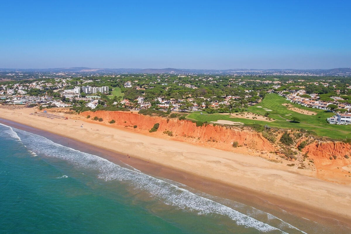 An aerial shot of the sea and sandy beaches in the Algarve, Portugal.