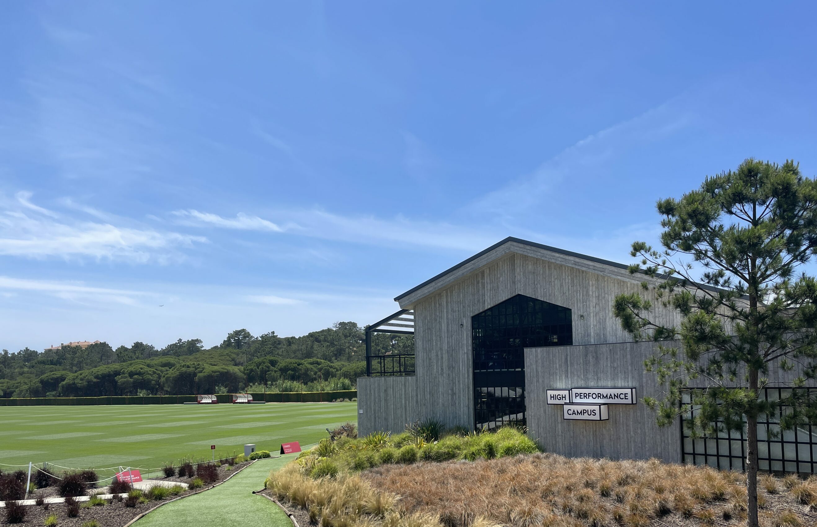 The Campus sports complex building with training pitch in the background.