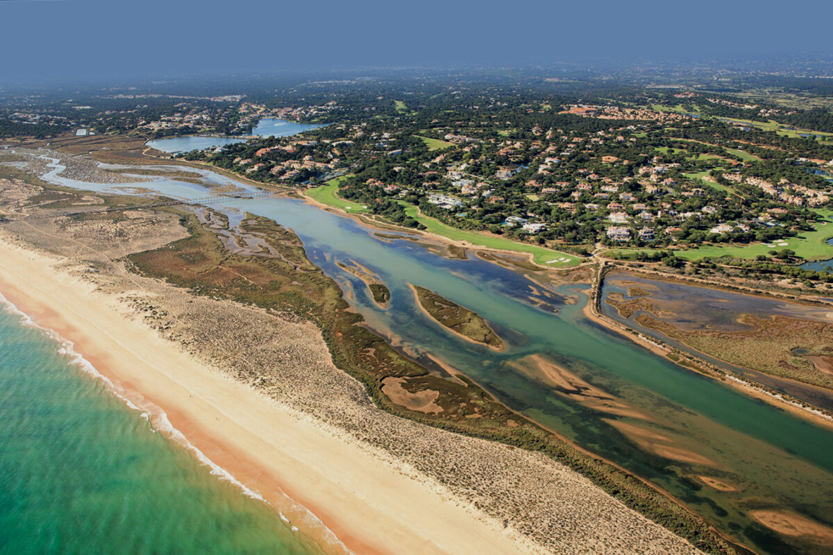 An aerial view of the beach and coastline by Quinta do Lago in Portugal